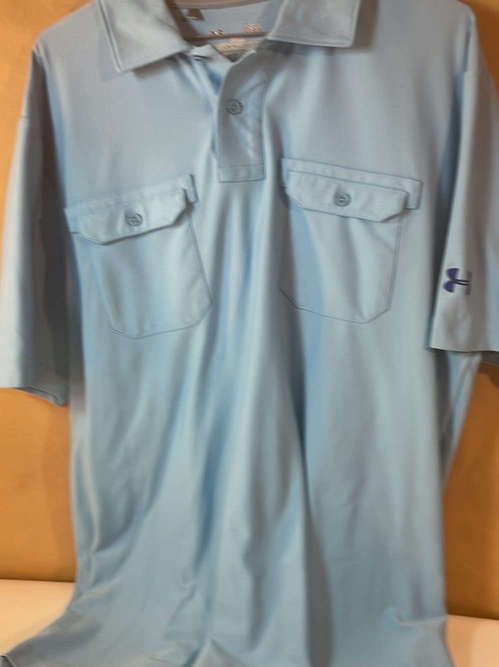 Under Armour Men’s Light Blue Performance Polo with Dual Chest Pockets